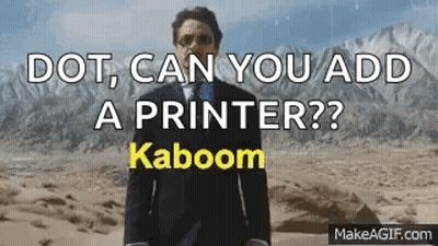 A Man In A Suit And Tie Is Standing In The Desert With The Words " Dot Can You Add A Printer ? " GIF