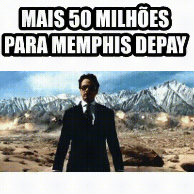 A Man In A Suit And Tie Is Standing In The Middle Of A Desert . GIF