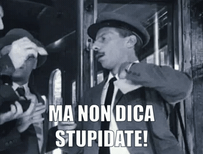 A Man In A Suit And Tie Is Standing Next To Another Man And Says Ma Non Dica Stupidate ! GIF