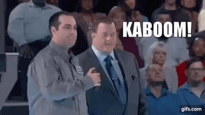 A Man In A Suit And Tie Is Standing Next To Another Man In A Crowd Of People . GIF