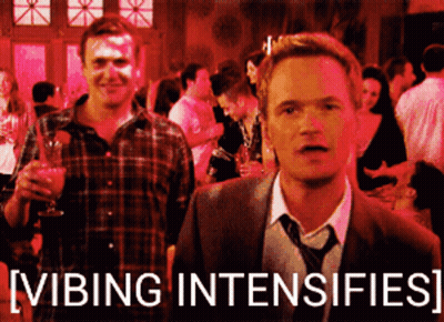 A Man In A Suit And Tie Is Standing Next To Another Man In A Plaid Shirt With The Words Vibing Intensifies GIF
