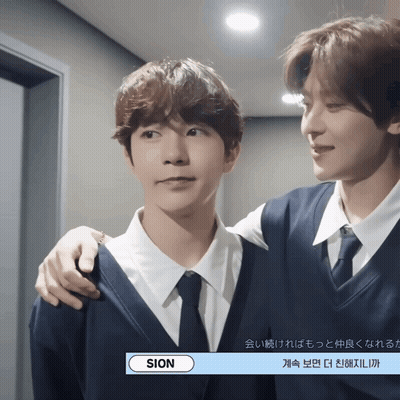 A Man In A Suit And Tie Is Standing Next To Another Man GIF