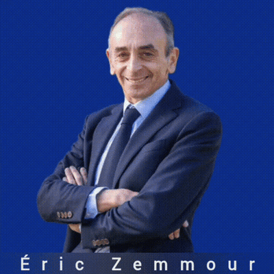 A Man In A Suit And Tie Is Standing With His Arms Crossed In Front Of A White Background With The Name Eric Zemmour On I GIF