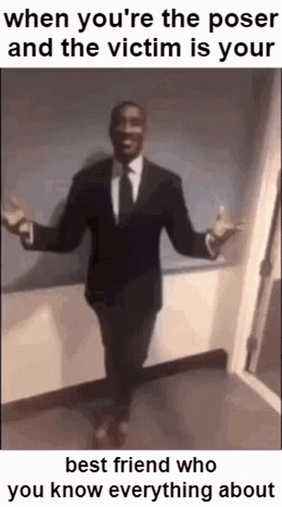 A Man In A Suit And Tie Is Standing With His Arms Outstretched . GIF