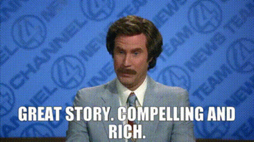 A Man In A Suit And Tie Is Talking About A Great Story GIF