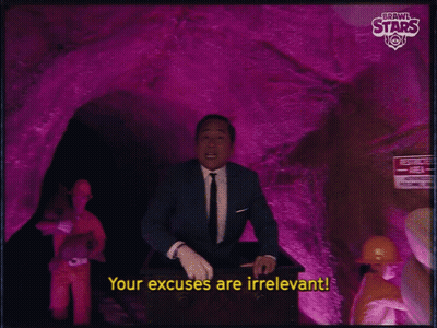 A Man In A Suit And Tie Is Talking About His Excuses GIF