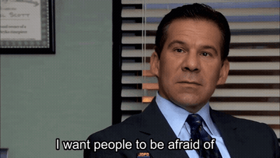 A Man In A Suit And Tie Is Talking About People GIF