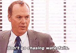 A Man In A Suit And Tie Is Talking About Waterfalls GIF