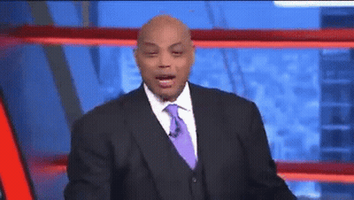 A Man In A Suit And Tie Is Talking On A Television Show GIF