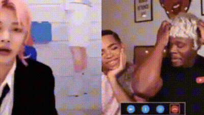 A Man In A Suit And Tie Is Talking On A Video Call With Another Man . GIF