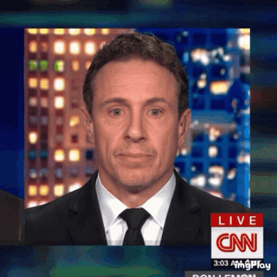 A Man In A Suit And Tie Is Talking On Cnn Live GIF