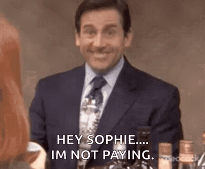A Man In A Suit And Tie Is Talking To A Woman . GIF