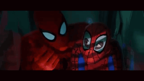 A Man In A Suit And Tie Is Talking To A Woman In A Room GIF