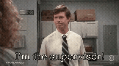 A Man In A Suit And Tie Is Talking To A Woman In An Office And Saying `` I 'M The Supervisor ! '' GIF