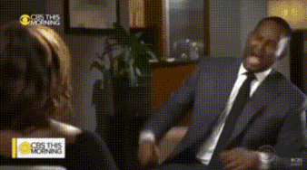 A Man In A Suit And Tie Is Talking To A Woman On Cbs Morning GIF