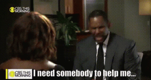 A Man In A Suit And Tie Is Talking To A Woman On The Cbs This Morning Show GIF