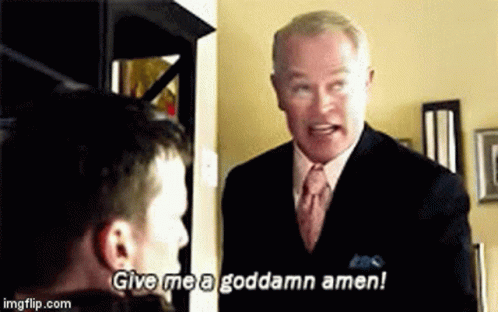 A Man In A Suit And Tie Is Talking To Another Man And Says `` Give Me A Goddamn Amen '' . GIF