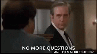 A Man In A Suit And Tie Is Talking To Another Man In A Room With The Words `` No More Questions '' . GIF