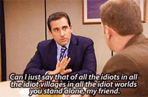 A Man In A Suit And Tie Is Talking To Another Man In A Suit And Tie . GIF