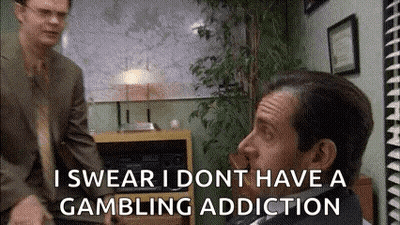 A Man In A Suit And Tie Is Talking To Another Man In A Suit And Tie In A Room . GIF