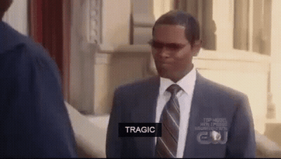 A Man In A Suit And Tie Is Talking To Another Man In A Suit And Tie . GIF