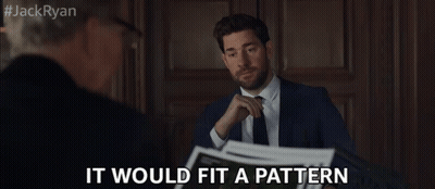 A Man In A Suit And Tie Is Talking To Another Man With The Words " It Would Fit A Pattern " Next To Him GIF