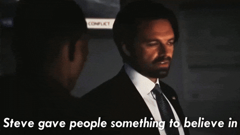 Man In Suit Talking To Another With Aspire To Text GIF