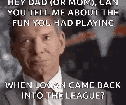 A Man In A Suit And Tie Is Talking To Someone About The Fun He Had Playing . GIF