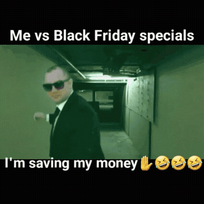 A Man In A Suit And Tie Is Walking Down A Hallway In A Meme About Black Friday Specials GIF