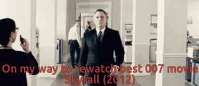 A Man In A Suit And Tie Is Walking Down A Hallway With The Words On My Way To Rewatch Best 007 Movie Skyfall 2012 GIF