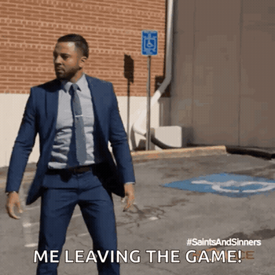 A Man In A Suit And Tie Is Walking Down A Street And Says " Me Leaving The Game " GIF