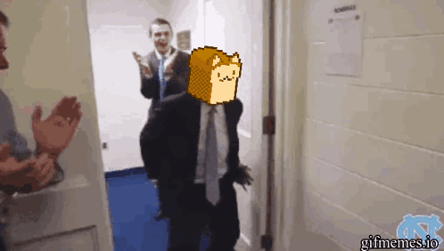 A Man In A Suit And Tie Is Walking Through A Door With A Gif Meme On The Bottom GIF