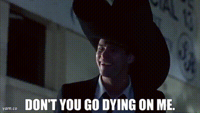 a man in a suit and tie is wearing a cowboy hat and saying " don 't you go dying on me "