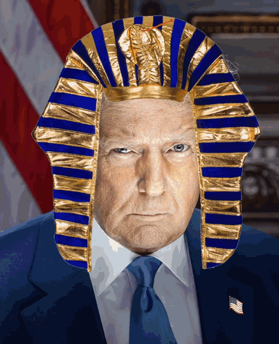 A Man In A Suit And Tie Is Wearing A Pharaoh Costume GIF