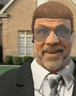A Man In A Suit And Tie Is Wearing Sunglasses And Headphones GIF