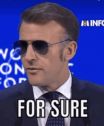 A Man In A Suit And Tie Is Wearing Sunglasses And Saying For Sure . GIF
