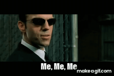 A Man In A Suit And Tie Is Wearing Sunglasses And Saying `` Me , Me , Me `` . GIF