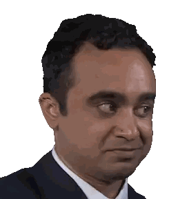 A Man In A Suit And Tie Looks At The Camera Sticker