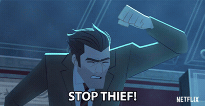A Man In A Suit And Tie Pointing With The Words Stop Thief Written Below Him GIF
