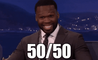 A Man In A Suit And Tie Points At The Number 50 GIF