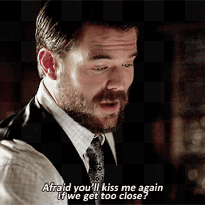 A Man In A Suit And Tie Says " Afraid You Ll Kiss Me Again If We Get Too Close " GIF