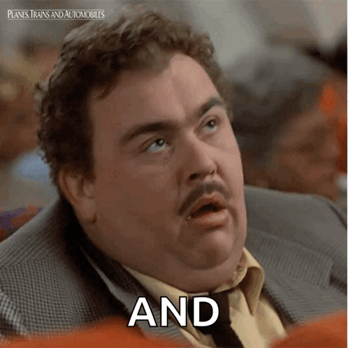 A Man In A Suit And Tie Says And In Front Of Planes Trains And Automobiles GIF