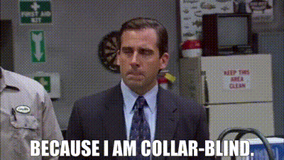 A Man In A Suit And Tie Says Because I Am Collar-Blind . GIF