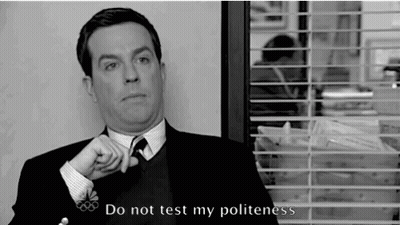 A Man In A Suit And Tie Says " Do Not Test My Politeness " In A Black And White Photo GIF