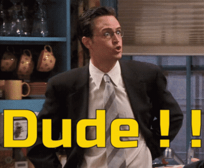 A Man In A Suit And Tie Says Dude In Yellow GIF