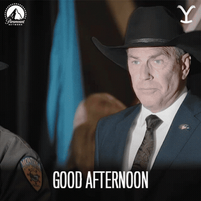 A Man In A Suit And Tie Says Good Afternoon In A Paramount Network Ad GIF
