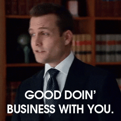 A Man In A Suit And Tie Says Good Doin Business With You GIF