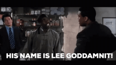 A Man In A Suit And Tie Says His Name Is Lee Goddamnit . GIF