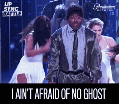 A Man In A Suit And Tie Says I Ain 'T Afraid Of No Ghost While Dancing GIF