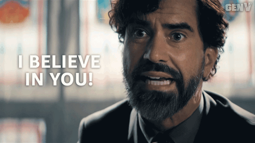A Man In A Suit And Tie Says I Believe In You GIF
